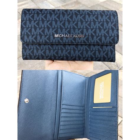 michael kors blue wallet men's|Michael Kors oversized wallet.